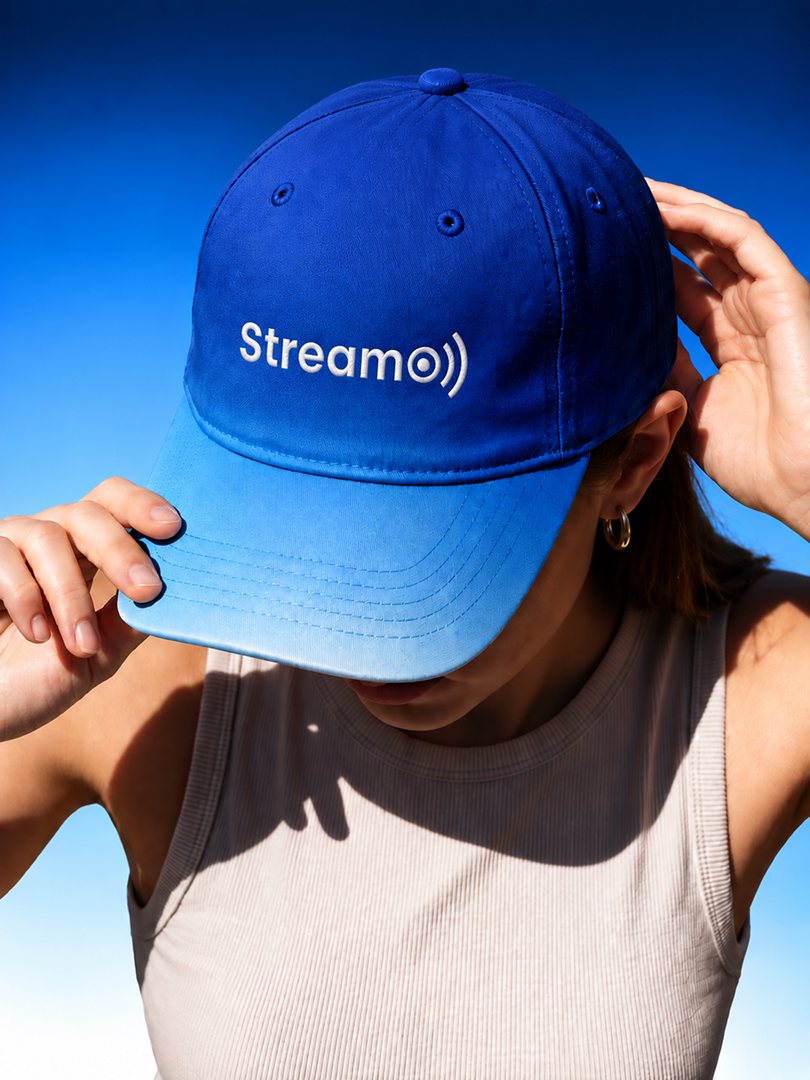 A person wearing a StreamO cap